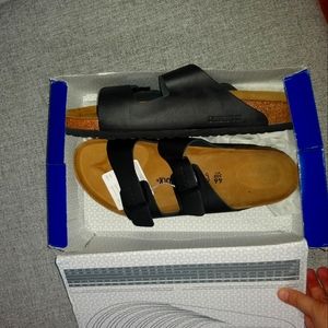 Brand new, never worn birkenstocks. Arizona BS black. Mens, US size 13.